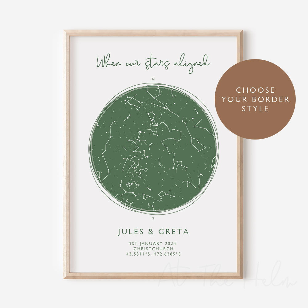 A framed custom star map print with the title 'When our stars aligned' and personalised text for 'Jules & Greta' on the bottom, depicting a map of the stars on white photographic paper with green text and accents.
Note at the top of image reads "choose your border style"