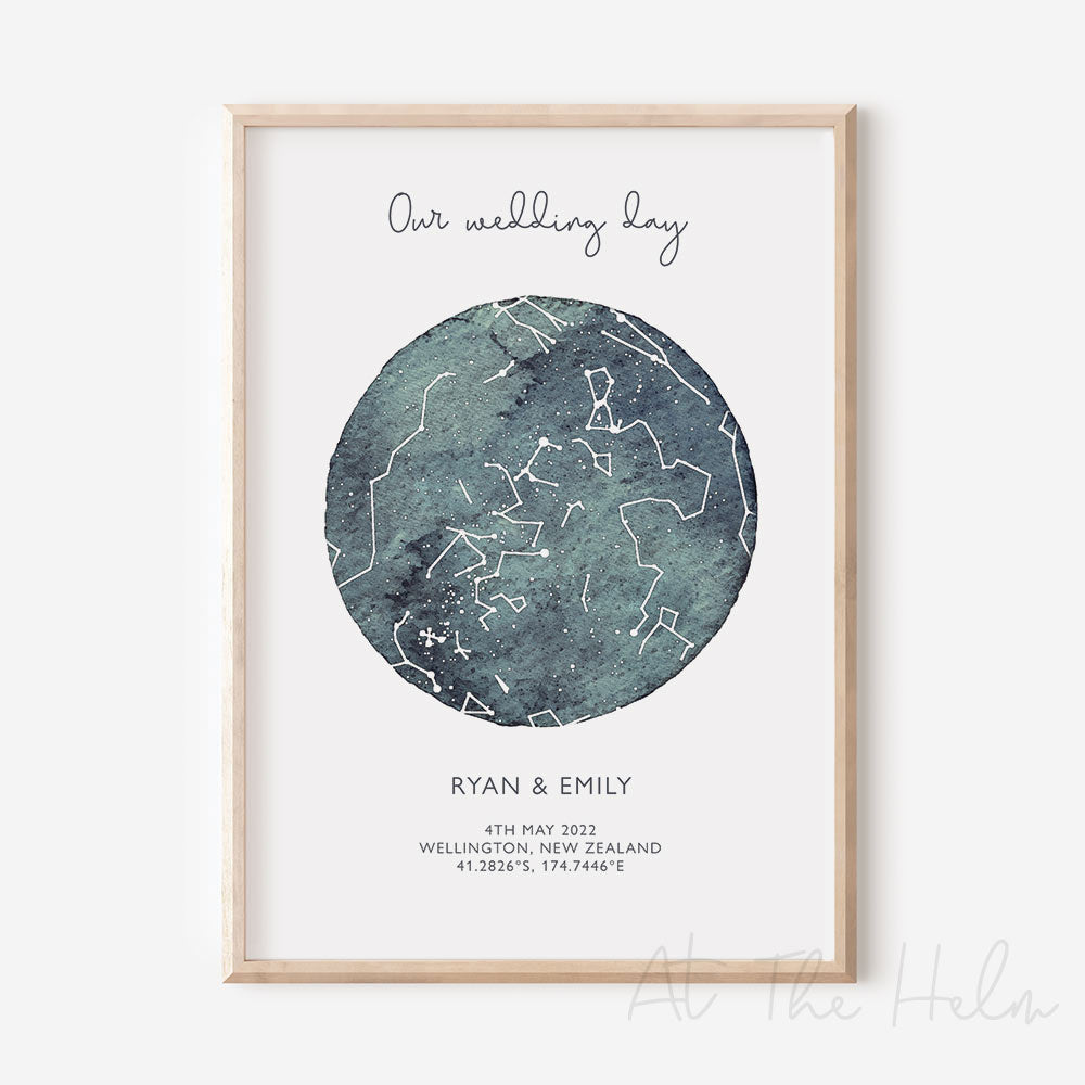 Framed custom green watercolour star map print with text personalization.
Headline text reads " Our Wedding Day". Secondary text at the bottom reads " Ryan & Emily" and then a personalised special date, location and map coordinates.
