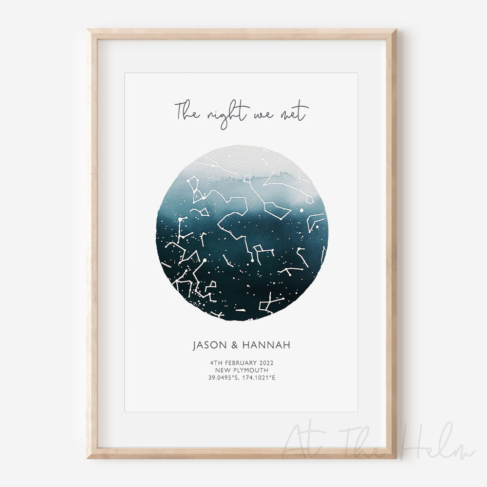 Framed custom blue watercolour star map print with text personalization.
Headline text reads " The Night We Met". Secondary text at the bottom reads " Jason & Hannah" and then a personalised special date, location and map coordinates.